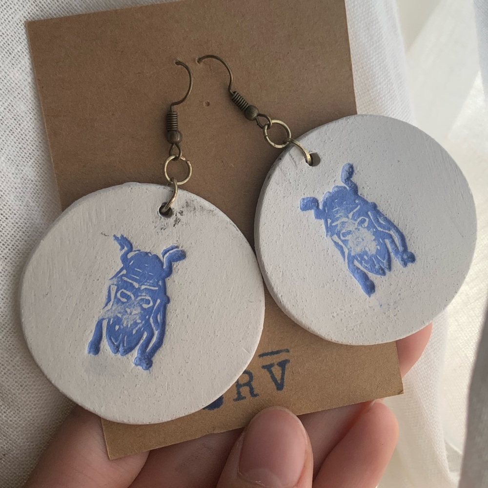 big blue handmade beetle earrings! natural unglazed stoneware ceramic round